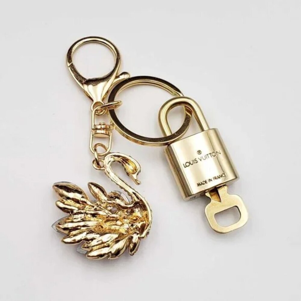 Louis Vuitton Gold Padlock Key 🔒 Authentic LV Charm + Unbranded Swan Keychain - Picture 3 of 8